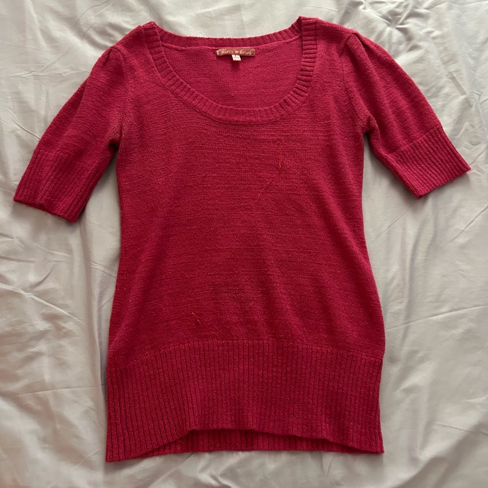 Pink knitted sweater